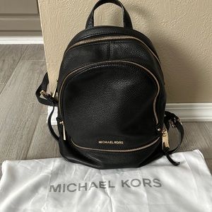 Michael Kors black leather backpack. Medium size